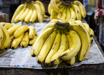Fresh yellow ripe banana at fruit store for sale at evening