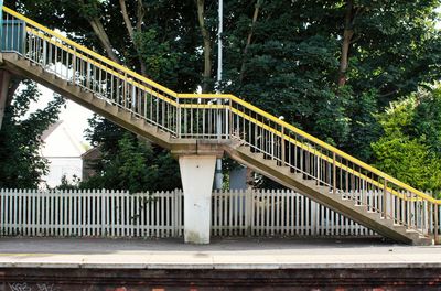 Railing with railings in background