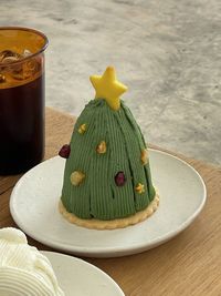 High angle view of red flower on table