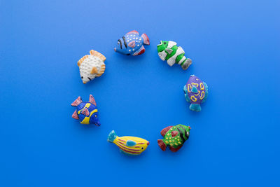 Close-up of candies against blue background