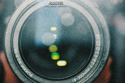 High angle view of camera on mirror