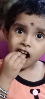 Close-up portrait of cute girl