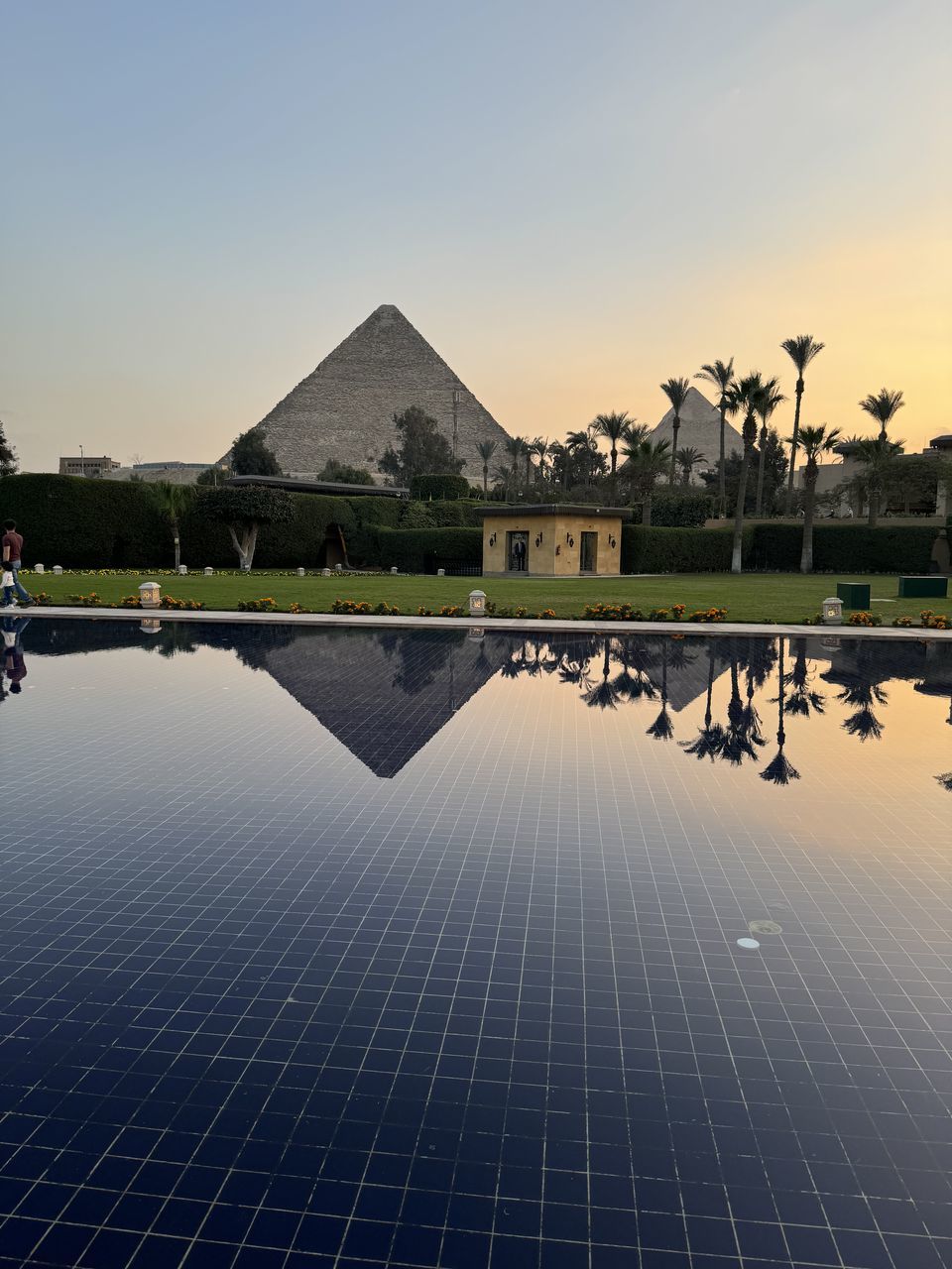 reflection, nature, sky, architecture, built structure, outdoors, screenshot, no people, water, day, city, tower, building exterior, skyscraper, light