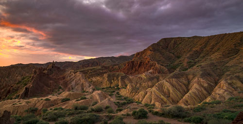 Scenic view of mountains against sky during sunset