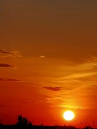 Low angle view of silhouette trees against sky during sunset