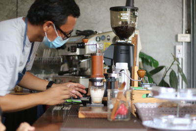 People working in kitchen