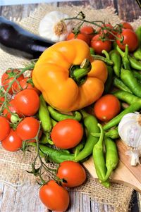 High angle view of tomatoes in basket on table