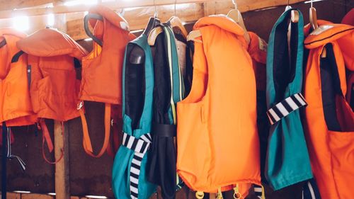 Life jackets hanging in store