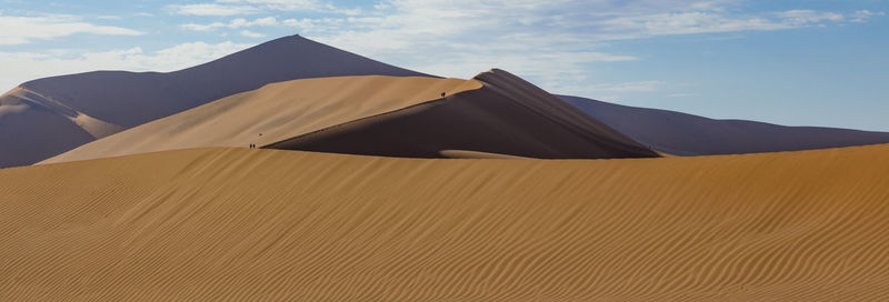 Scenic view of desert against sky