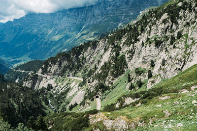 Scenic view of landscape and mountains against sky