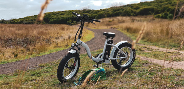 Bicycle parked on field