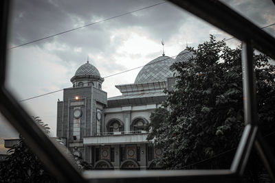 Low angle view of buildings against sky