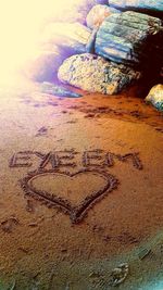 Heart shape on rock at beach