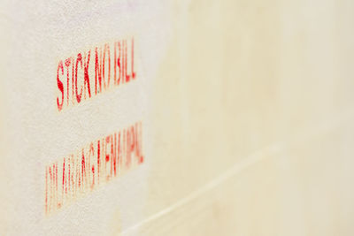 Close-up of text on wall