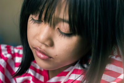 Close-up of girl with bangs