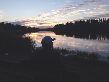 Scenic view of lake at sunset