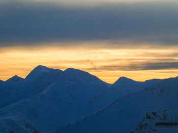 Sunset in snowy austrian mountains