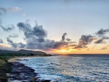 Scenic view of sea against sky during sunset