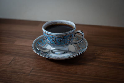 High angle view of coffee cup on table