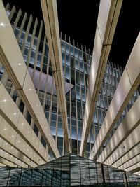 Low angle view of modern building at night