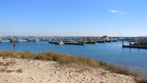 Pier over sea against sky