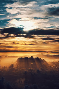 Low angle view of cloudscape during sunset