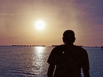 Scenic view of sea at sunset