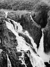 Scenic view of waterfall in forest