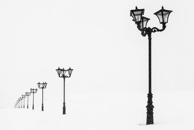 Low angle view of street light against clear sky