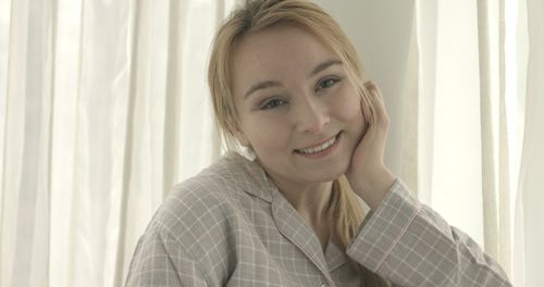 Portrait of smiling young woman