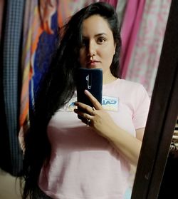 Young woman using mobile phone