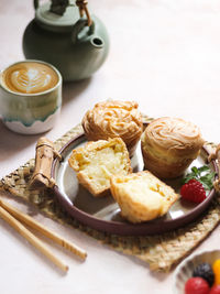 Vanilla soes cakes or soes vla served in plate. selective focus