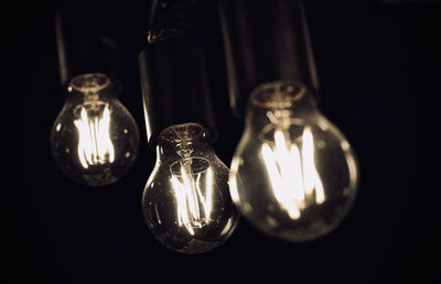 Close-up of illuminated light bulb