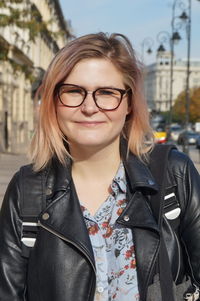 Portrait of smiling mature woman wearing eyeglasses