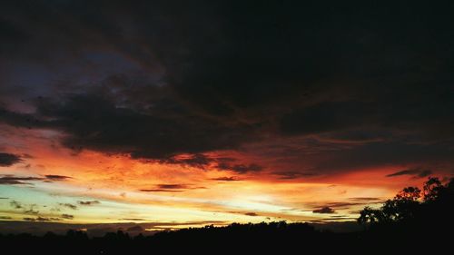 Scenic view of dramatic sky during sunset