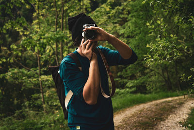 Man photographing with camera