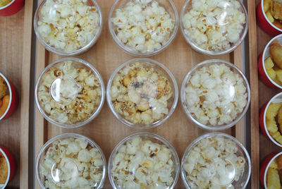 Directly above shot of popcorns in container for sale
