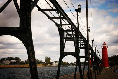 Bridge over river against sky