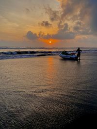 Scenic view of sea against sky during sunset