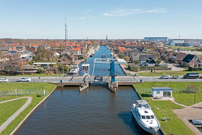 Boats moored at harbor