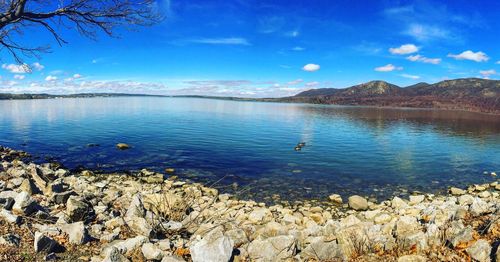 Scenic view of blue sea against sky