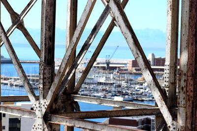 Bridge in city against sky