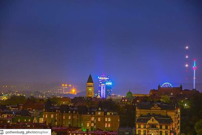 Illuminated buildings in city at night