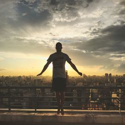 Full length of a man with cityscape in background