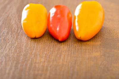 Close-up of yellow bell peppers on table