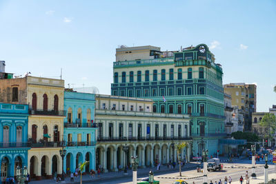 Buildings in city against sky