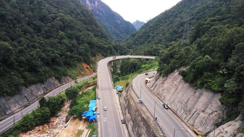 High angle view of bridge amidst mountains