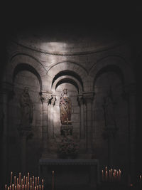 Statue in illuminated building