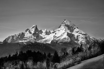 Scenic view of snowcapped mountains against sky