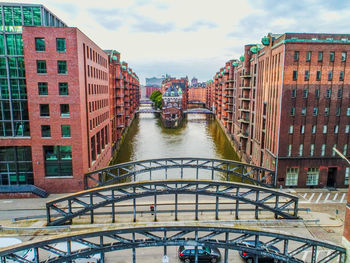 High angle view of canal passing through city